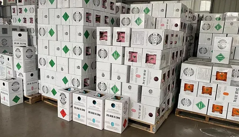 Pallets of stacked refrigerant cylinder cartons in the warehouse